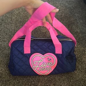 Justice hand and shoulder bag
